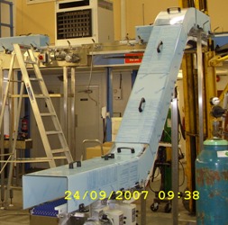 Swan Neck Magnetic Conveyors with plastic covers image